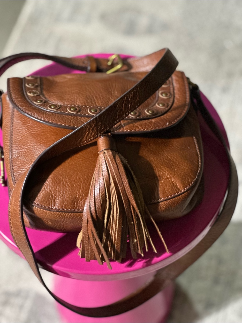 Fossil EMI Brown Leather Studded Tassel Saddle Crossbody Bag.